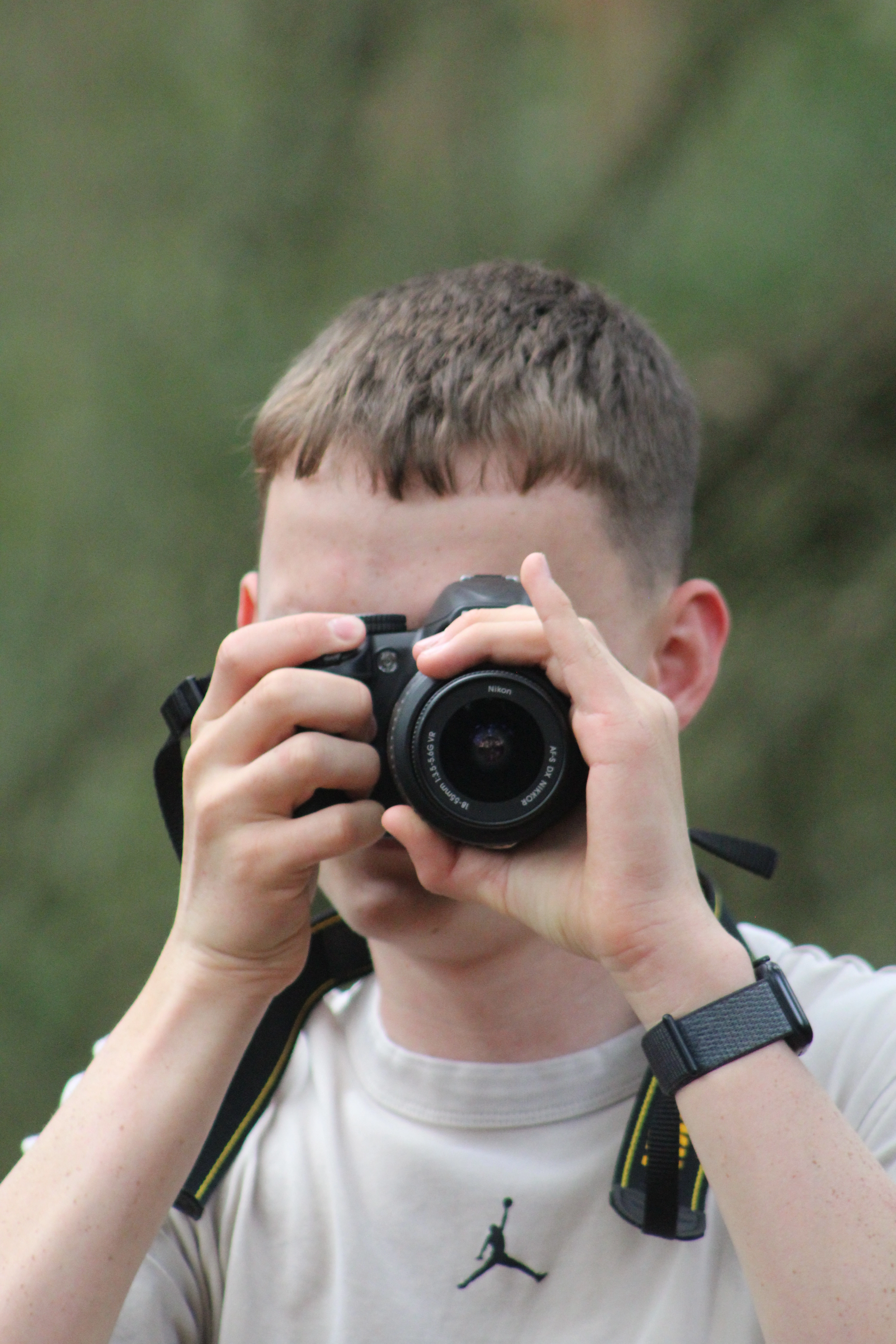 Alfie Leek shooting with a camera